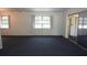 Spacious bedroom featuring sliding glass door closet and natural light at 6327 Skyline Ct, Spring Hill, FL 34606