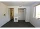 This bedroom features an open closet, doorway and a window at 6327 Skyline Ct, Spring Hill, FL 34606