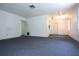 Bright and airy unfurnished room with neutral walls and carpet at 6327 Skyline Ct, Spring Hill, FL 34606
