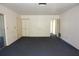 Unfurnished room with carpet, closet, and view of outdoor space at 6327 Skyline Ct, Spring Hill, FL 34606