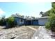 Charming single-story home with a front yard and attached garage at 6327 Skyline Ct, Spring Hill, FL 34606