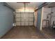 This is a look at a clean and empty garage with open door at 6327 Skyline Ct, Spring Hill, FL 34606
