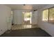 Living room featuring access to outside and ample space for entertaining and relaxation at 6327 Skyline Ct, Spring Hill, FL 34606