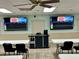 Community center room featuring bingo boards, tables, and chairs, perfect for community activities at 6338 Spring Flower Dr # 15, New Port Richey, FL 34653