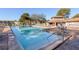 Large community swimming pool with lounge chairs and well-maintained surroundings at 6338 Spring Flower Dr # 15, New Port Richey, FL 34653