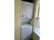 Efficient stacked washer and dryer unit, perfect for space-saving convenience at 6338 Spring Flower Dr # 15, New Port Richey, FL 34653