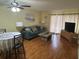 Inviting living and dining area with ceiling fan and views of the living room at 6338 Spring Flower Dr # 15, New Port Richey, FL 34653