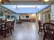 Spacious lobby with abundant natural light, comfortable seating, and views of the pool area at 6338 Spring Flower Dr # 15, New Port Richey, FL 34653