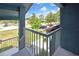 Enjoy relaxing balcony views overlooking the community with lush greenery and parking area at 7644 St Andrews Blvd # 0, Weeki Wachee, FL 34613