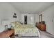 Comfortable bedroom with carpet, a bed, and furnishings and ensuite bathroom access at 7644 St Andrews Blvd # 0, Weeki Wachee, FL 34613