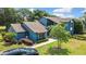 Charming blue condominium featuring well-maintained landscaping, and a private driveway at 7644 St Andrews Blvd # 0, Weeki Wachee, FL 34613