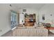 Bright living room featuring neutral decor, adjacent to a dining area with sliding glass doors at 7644 St Andrews Blvd # 0, Weeki Wachee, FL 34613