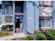 A vibrant condo exterior displaying detailed architectural elements and landscaping at 7662 St Andrews Blvd, Weeki Wachee, FL 34613