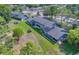 An aerial view showcases the condo community with lush lawn, creating a serene and inviting atmosphere at 7662 St Andrews Blvd, Weeki Wachee, FL 34613