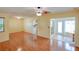 Open living area with laminate floors and lots of natural light at 7662 St Andrews Blvd, Weeki Wachee, FL 34613