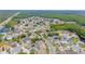 Aerial view of the residential community featuring mature trees and landscaping at 7827 Starfire Way, New Port Richey, FL 34654