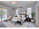 Beautiful main bedroom featuring tasteful decor and an enclosed patio at 7827 Starfire Way, New Port Richey, FL 34654