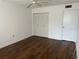 A bright bedroom with laminate flooring and ceiling fan at 840 Virginia St # 202, Dunedin, FL 34698