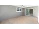 Spacious covered patio overlooking the backyard at 8522 Inwood Dr, Hudson, FL 34667