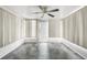 Sunroom featuring neutral walls, and a tile floor at 9015 Mark Twain Ln, Port Richey, FL 34668