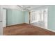 Inviting living room with a ceiling fan and carpet flooring at 9015 Mark Twain Ln, Port Richey, FL 34668