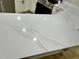 Close-up of kitchen island featuring marble countertops with unique patterns and textures at 9034 Cochise Ln, Port Richey, FL 34668
