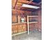 Interior of shed with wooden shelves, showing organized storage space at 9034 Cochise Ln, Port Richey, FL 34668