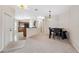 Open concept dining room that flows into the kitchen and living room; great for entertaining at 9048 Southern Charm Cir, Brooksville, FL 34613