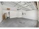 Spacious two car garage with ample room for storage and organization at 9048 Southern Charm Cir, Brooksville, FL 34613