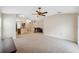 Open concept living room and dining room are perfect for modern living and entertaining at 9048 Southern Charm Cir, Brooksville, FL 34613