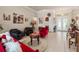 Open living room features tile floors, neutral walls, and access to other living spaces at 9245 Grand Cypress Dr, Spring Hill, FL 34613