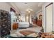 Spacious main bedroom with hardwood floors, sitting area, and natural light at 9245 Grand Cypress Dr, Spring Hill, FL 34613