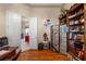 Another view of the office showing hardwood floors and white trim at 9245 Grand Cypress Dr, Spring Hill, FL 34613