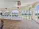 Bright banquet room with large windows offering water views at 10187 Holly Berry Dr, Weeki Wachee, FL 34613