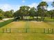 Spacious community dog park featuring green space and secure fencing for furry friends to safely play and exercise at 10187 Holly Berry Dr, Weeki Wachee, FL 34613