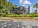 Elegant GlenLakes entrance sign surrounded by manicured landscaping, showcasing an upscale community at 10187 Holly Berry Dr, Weeki Wachee, FL 34613