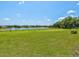 Scenic golf course next to a lake with lush green fairways at 10187 Holly Berry Dr, Weeki Wachee, FL 34613