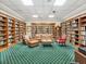 Inviting library with bookshelves, seating, and natural light at 10187 Holly Berry Dr, Weeki Wachee, FL 34613