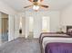 Relaxing main bedroom offers a ceiling fan and access to an ensuite bathroom at 10187 Holly Berry Dr, Weeki Wachee, FL 34613