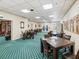 Meeting room with comfortable seating and adjacent library at 10187 Holly Berry Dr, Weeki Wachee, FL 34613