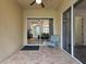 This covered patio offers the perfect spot to enjoy the backyard view at 10187 Holly Berry Dr, Weeki Wachee, FL 34613