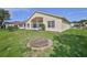 Spacious backyard with a screened lanai and views of surrounding landscaping, offering a private outdoor space at 1032 Walnut Hill Ct, Spring Hill, FL 34609