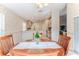 Dining area leading to kitchen and living room area at 1032 Walnut Hill Ct, Spring Hill, FL 34609