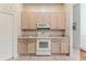 Kitchen cabinets and appliances at 1032 Walnut Hill Ct, Spring Hill, FL 34609