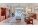 Spacious living room featuring comfortable furniture and a view of the outdoor patio at 1032 Walnut Hill Ct, Spring Hill, FL 34609
