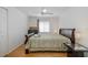 Relaxing bedroom with hardwood floors and ample natural light at 10906 New Brighton Ct, New Port Richey, FL 34654