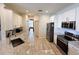 Kitchen featuring stainless steel appliances, granite countertops, and wood-look floors at 1121 Riveredge Dr, Tarpon Springs, FL 34689