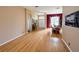 Spacious living room with hardwood floors, dining area, and natural light at 1121 Riveredge Dr, Tarpon Springs, FL 34689