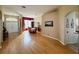 Spacious living room with hardwood floors, dining area, and natural light at 1121 Riveredge Dr, Tarpon Springs, FL 34689