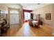 Spacious living room with hardwood floors and ample natural light at 1121 Riveredge Dr, Tarpon Springs, FL 34689